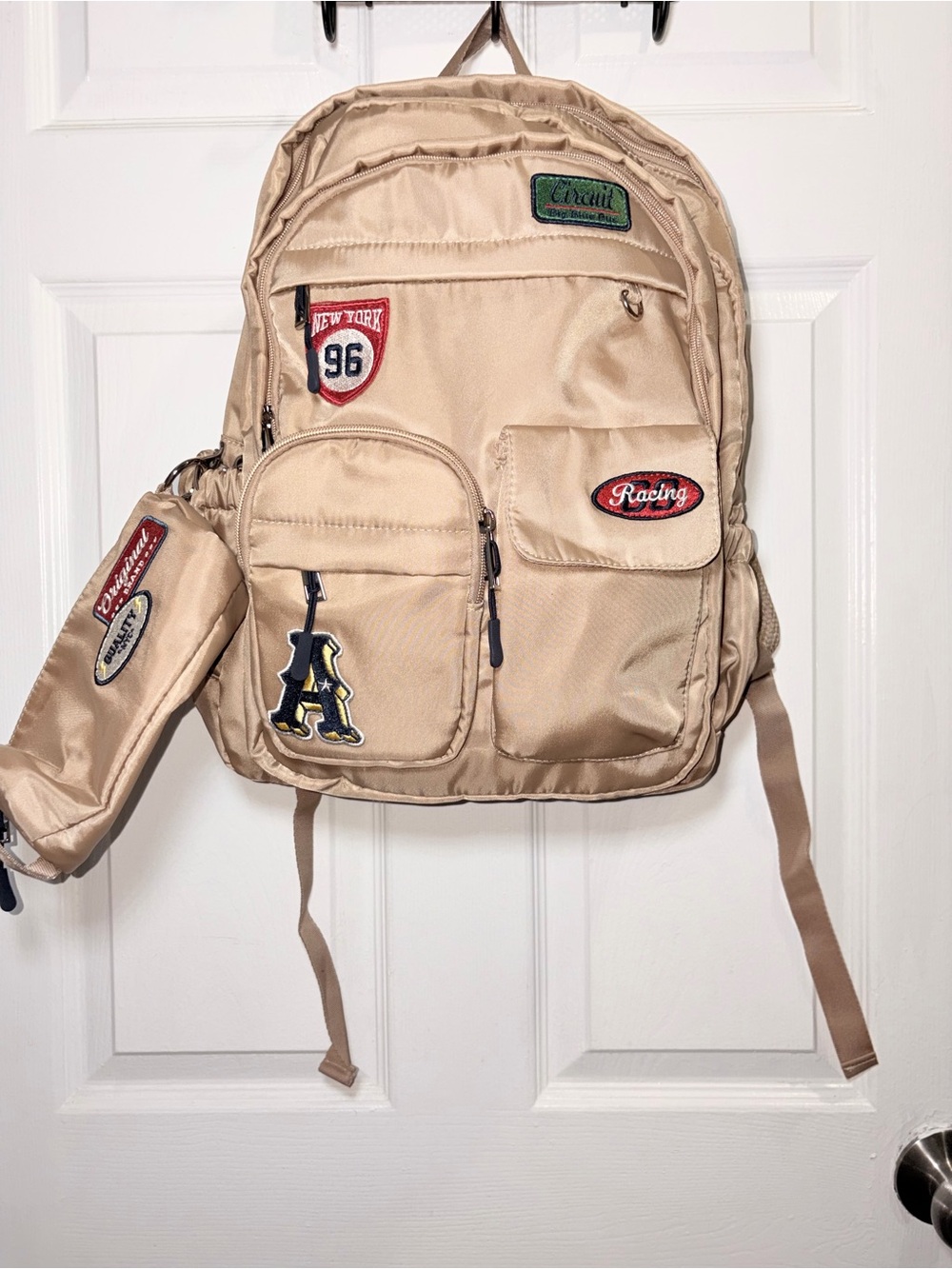 Beige Backpack with Patch Details